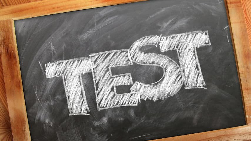 Translation Questions: Test Your Language Knowledge. Illustration of the word "test" written with chalk over a blackboard. Picture of Geralt at Pixabay. Pixabay License. https://pixabay.com/photos/board-school-university-to-learn-2450236/