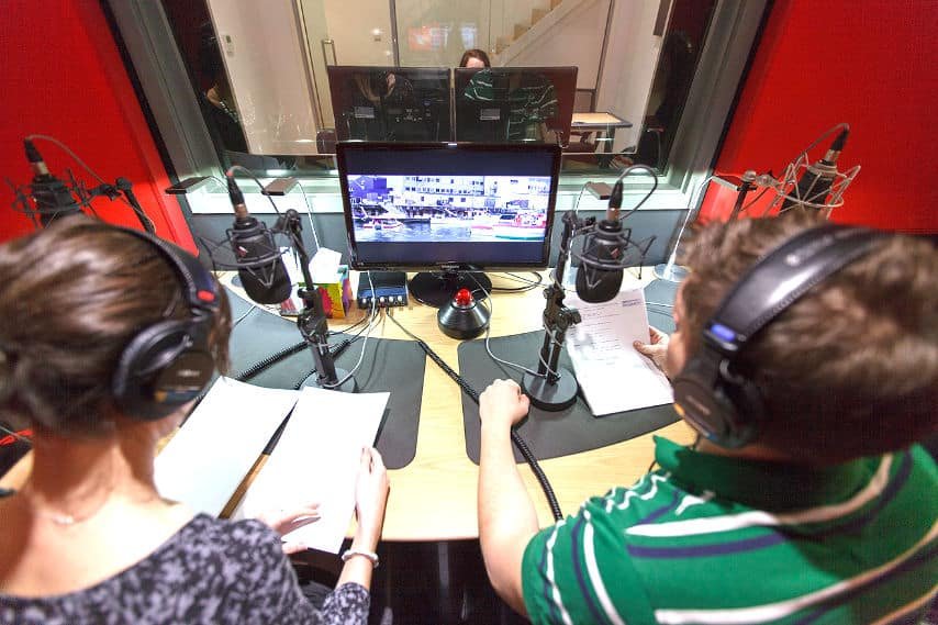 Voice actors working at GoLocalise Voice-Over recording studio in London UK