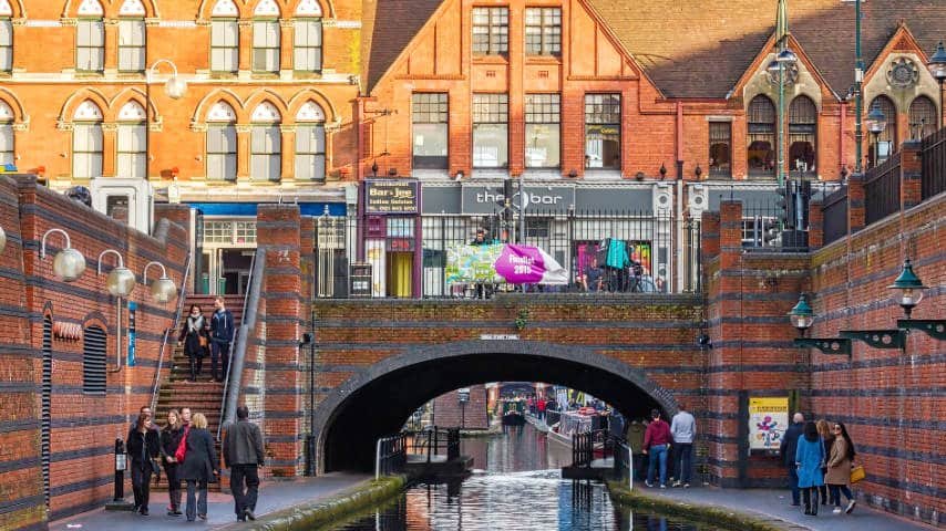 What is a Brummie Accent. Form of non-standard English. Photo of people walking through Broad Street Tunnel at Birmingham. Picture by Phil Wild at Pixabay. Pixabay License. https://pixabay.com/photos/birmingham-canal-broad-street-tunnel-1938916/