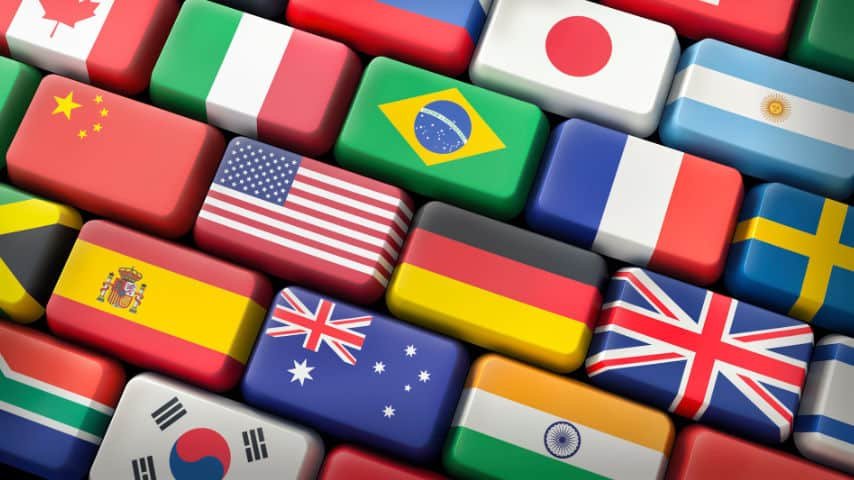 Differences Between Interpretation and Translation. Several Countries Flags over a computer keyword. Illustration by AbsolutVision at Pixabay. Pixabay License. https://pixabay.com/illustrations/translation-keyboard-computer-7774314/