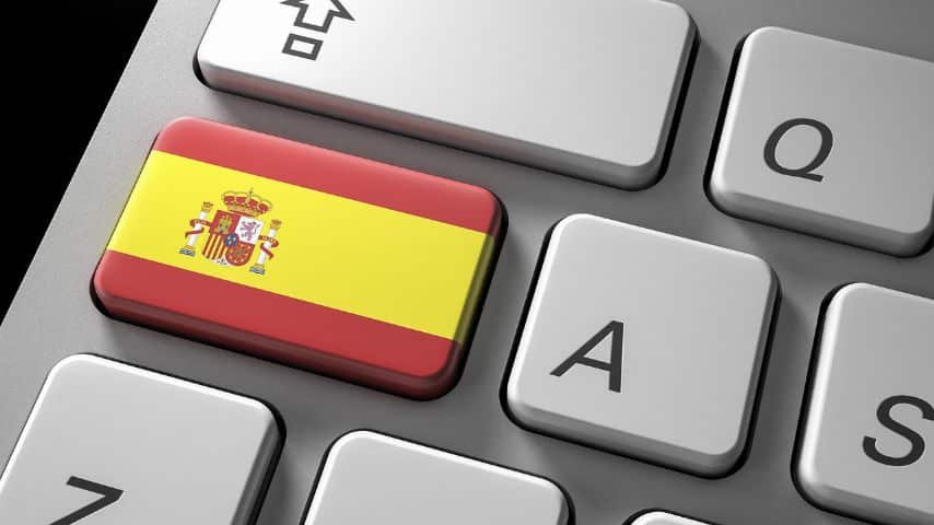 Beware False Friends in Spanish Translation! Picture of a keyword with a Spanish Flag over a key by AbsolutVision at Pixabay. Pixabay License. https://pixabay.com/illustrations/technology-flag-internet-keyboard-2646431/