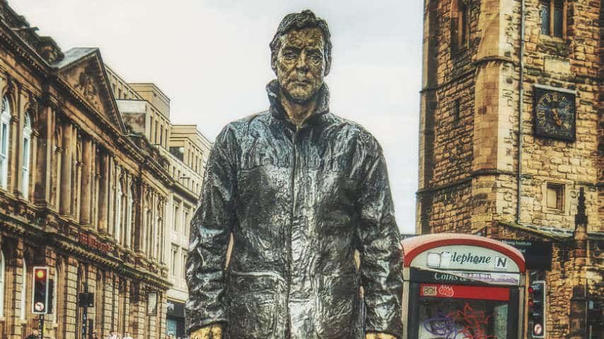 What is a Geordie Accent? Picture of a Statue of a Miner in a Newcastle upon Tyne, England, UK street by K. Mitch Hodge at Unsplash. Unsplash License. https://unsplash.com/es/fotos/FSNB_1p3XLE