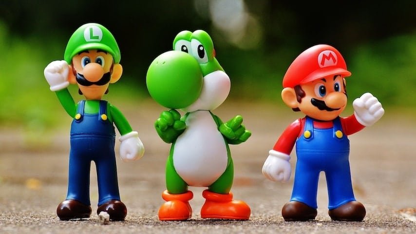 Video Game Voice Over Jobs. Image of figures of Super Mario, Luigi and Yoshi from Nintendo. This image is used to illustrate the article "Video Game Voice Over Jobs: Insider Secrets." Pexels license: https://www.pexels.com/photo/focus-photo-of-super-mario-luigi-and-yoshi-figurines-163036/