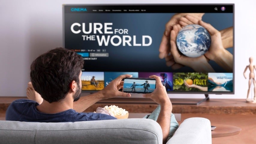 How to Translate Film. Photo of Man watching streaming service on his tv. Image licence from FreePik: https://www.freepik.com/free-photo/man-watching-streaming-service-his-tv_16624176.htm This image is being used to illustrate the article "How to Translate Film."