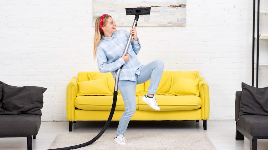 Appliance Commercial Script Sample. Image of a woman doing house chores with vacuum. This image is used to illustrate the article “Appliance Commercial Script Sample.” Freepik license: https://www.freepik.com/free-photo/woman-doing-house-chores-with-vacuum_6446897.htm